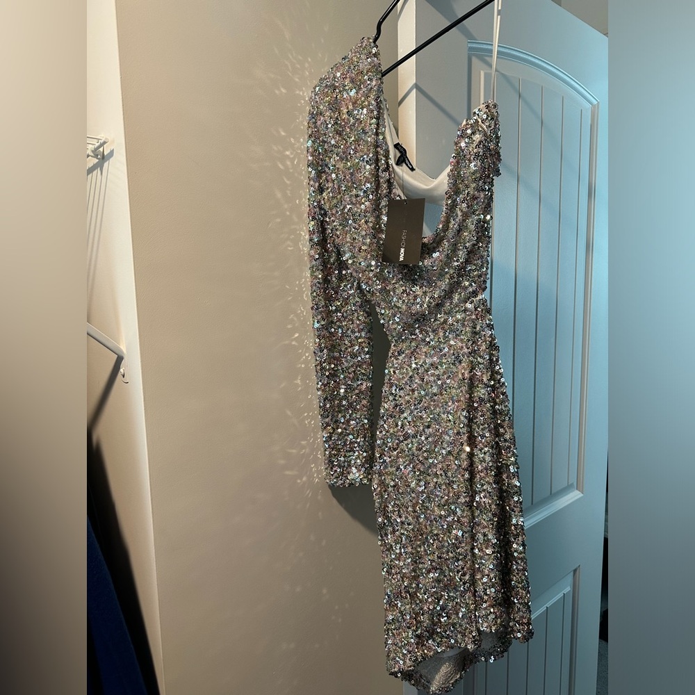 Brand new fashion nova dress. One shoulder and open back.